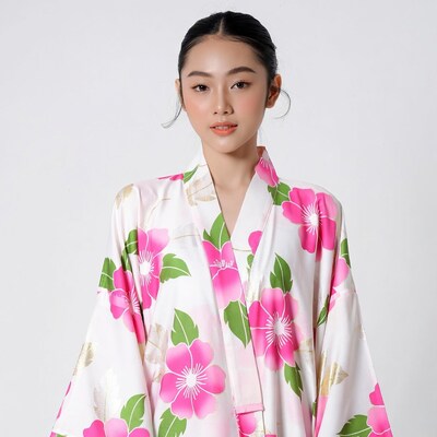 Asian woman in pink floral kimono