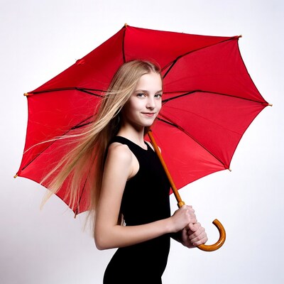 Girl holding red umbrella