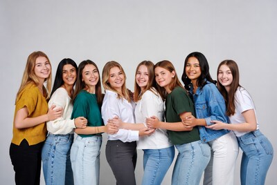 Group of young women hugging together