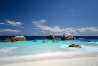 Granite boulders in turquoise beach lagoon