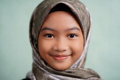 Smiling Asian girl in hijab