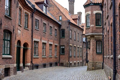Cobblestone Courtyard with Brick Houses