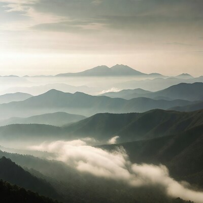 Misty Layered Mountains with Fog