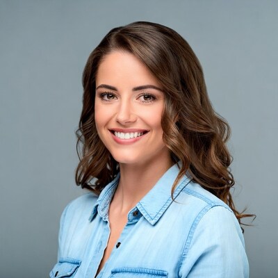 Smiling woman in blue denim shirt