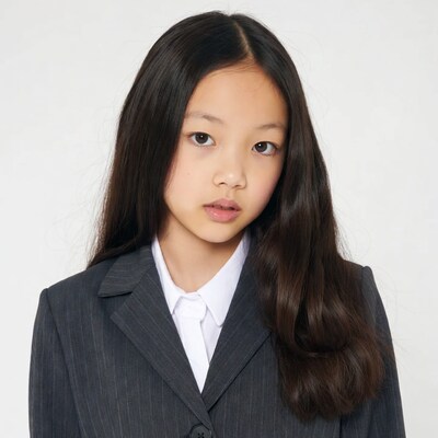 Asian girl in gray suit