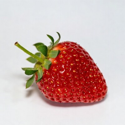 Fresh strawberry with green leaves