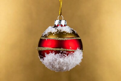 Red gold Christmas ornament with snow