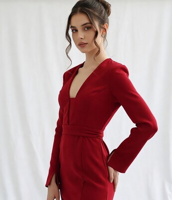 Woman in red dress side profile