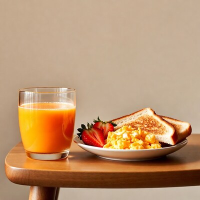 Scrambled Eggs with Toast and Orange Juice