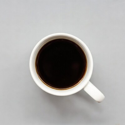White coffee mug with black coffee