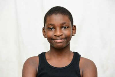 Smiling African boy in tank top