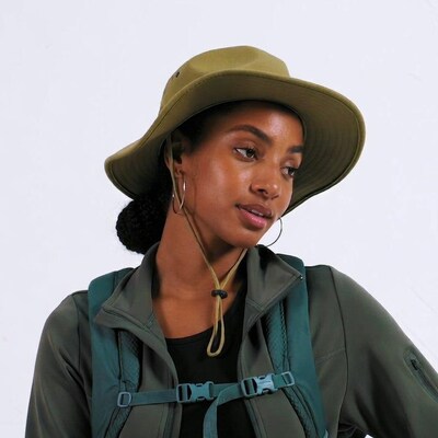 African-American woman in green bucket hat
