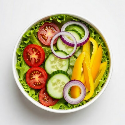 Fresh salad in white bowl