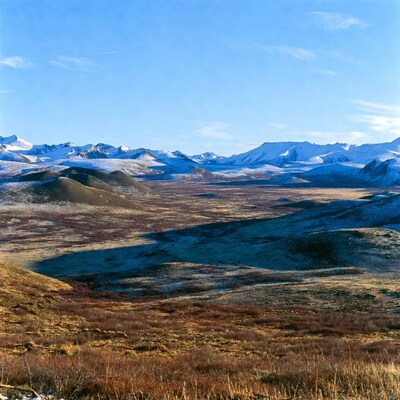 Snowy Mountains Over Autumn Tundra Valley
