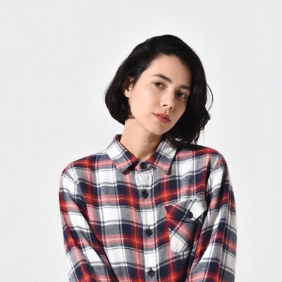 Asian woman in plaid shirt