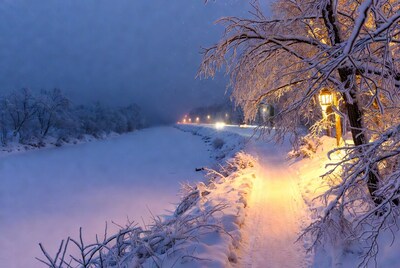 Snowy Winter Path with Lantern and Road