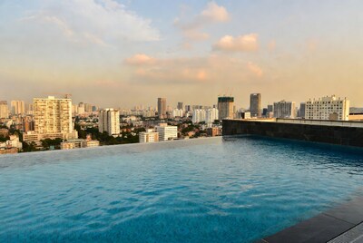 Infinity pool overlooking city skyline