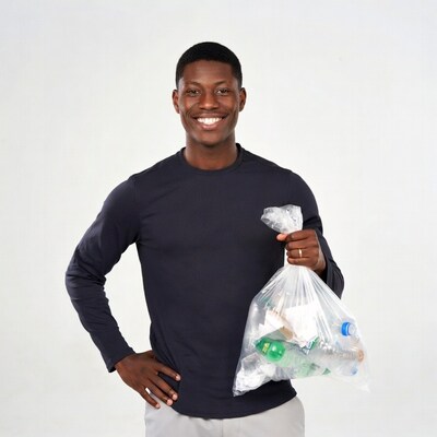African-American man holding recycling bag