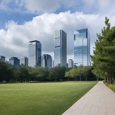 Skyscrapers over green park path