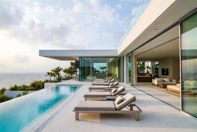 Modern infinity pool overlooking ocean