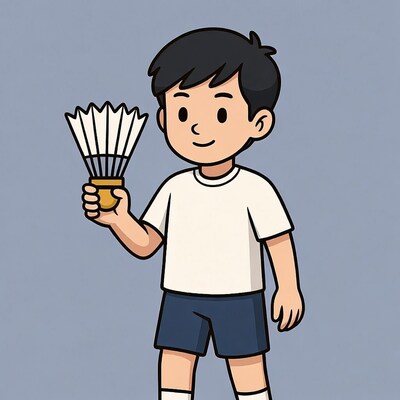 Asian boy holding badminton racket