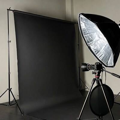 Photography Studio Setup with Black Backdrop
