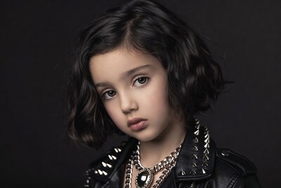 Girl in studded leather jacket