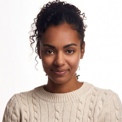 African-American woman smiling in sweater
