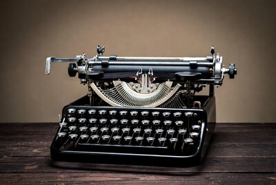 Vintage Typewriter on Wooden Desk