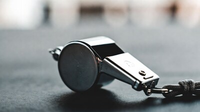 Silver whistle with lanyard