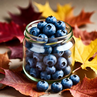 Blueberries in Jar with Autumn Leaves