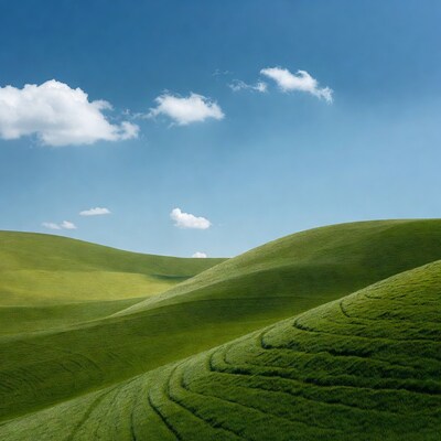 Rolling Green Hills Under Blue Sky