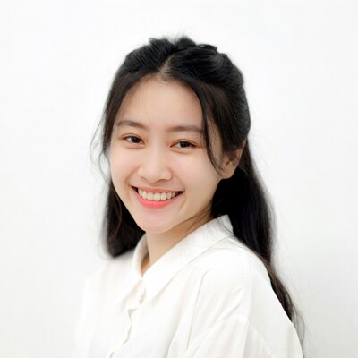 Smiling Asian woman in white shirt