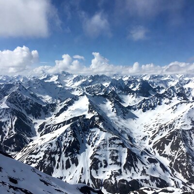 Snowy Mountain Range Blue Sky