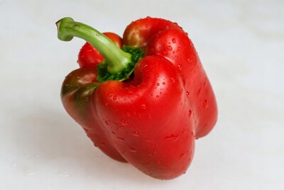 Red bell pepper with water droplets
