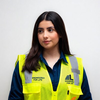 Woman in yellow safety vest