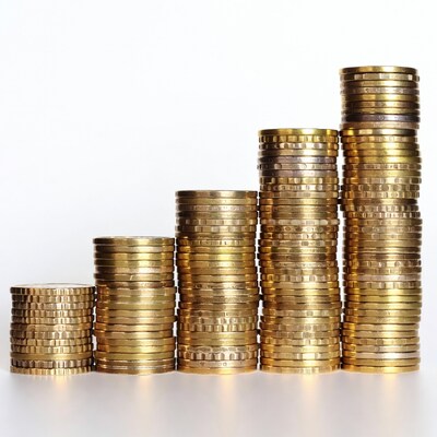 Stacks of Gold Coins Forming Bar Graph