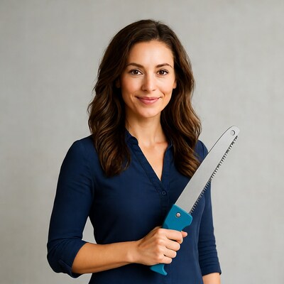 Woman holding handsaw