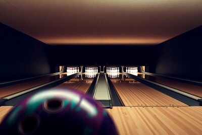 Bowling Ball Rolling Toward Pins