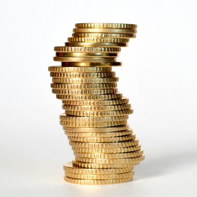 Tall stack of gold coins