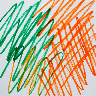 Green and orange crayon scribbles