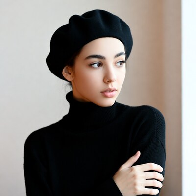 Asian woman in black beret and turtleneck