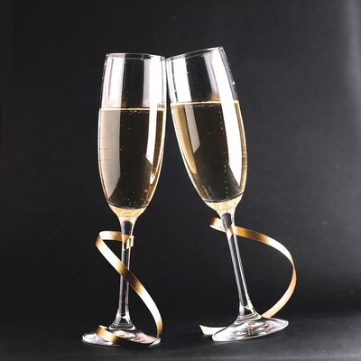 Two Champagne Glasses with Gold Ribbons