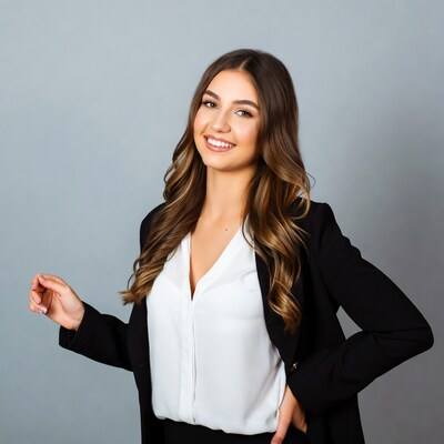 Smiling woman in black blazer