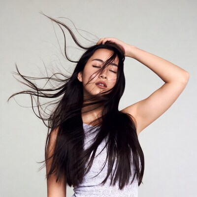 Asian woman with flowing black hair