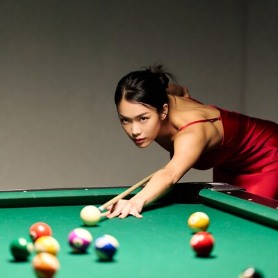 Asian woman playing pool in red dress