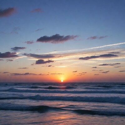 Sunset over ocean waves