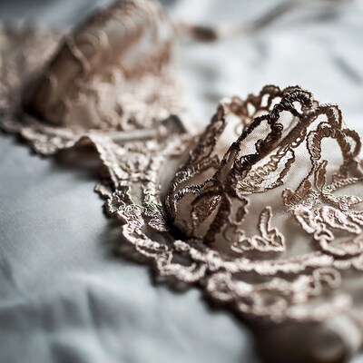 Lace Bra on White Fabric