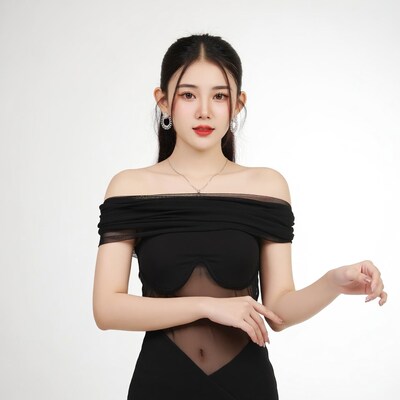 Asian woman in sheer black off-shoulder dress