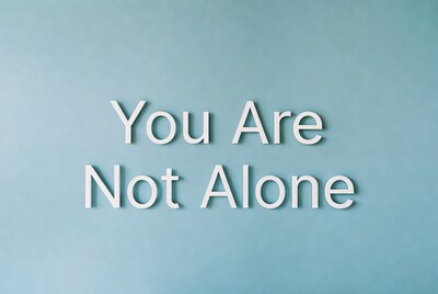 You Are Not Alone text